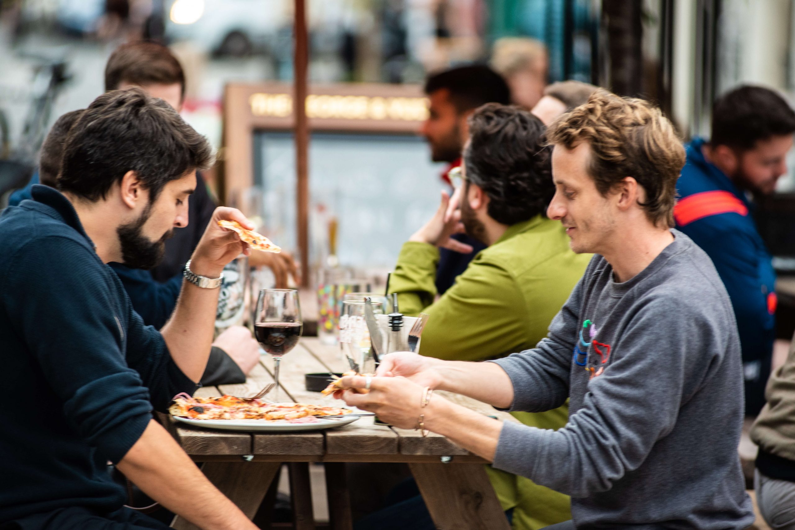 Pizza on the pavement tables